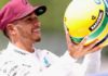 Lewis Hamilton with Senna's helmet